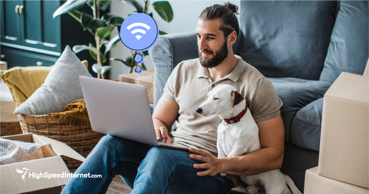 Man in new apartment searching for internet providers in his area on computer