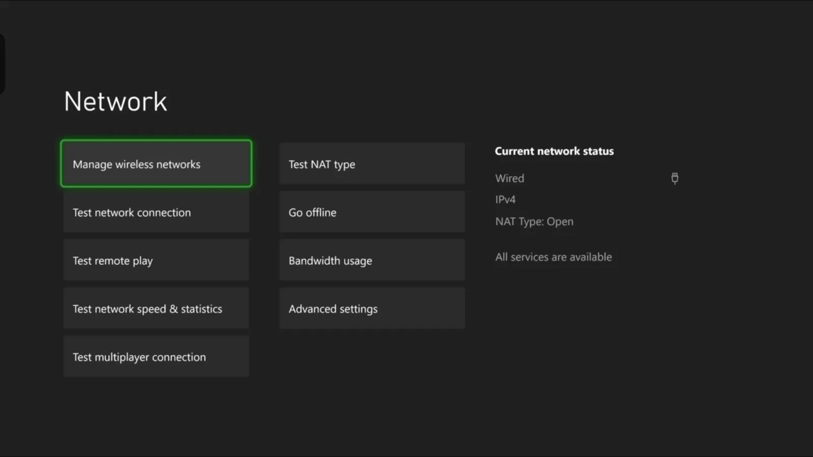 Xbox Network menu with Manage wireless networks outlined in green