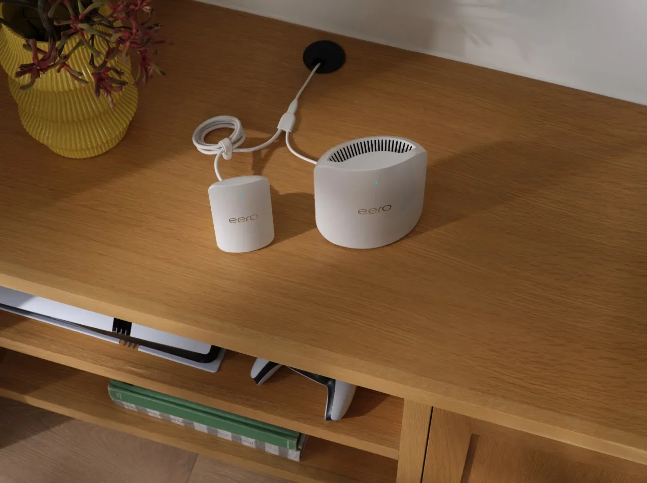 An Eero Max 7 mesh Wi-Fi 7 router paired with an Eero Signal cellular backup dongle