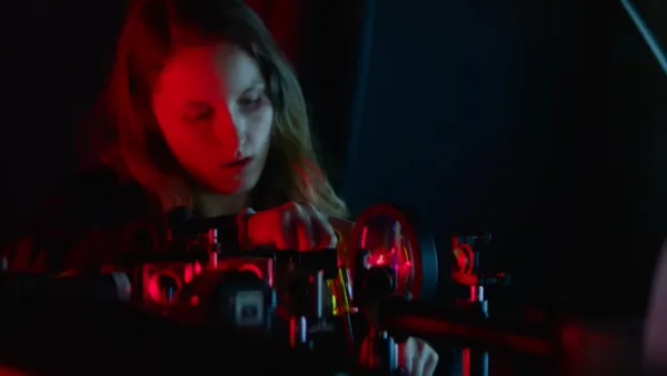 Amazon Leo employee working on optical systems. Image courtesy of Amazon.